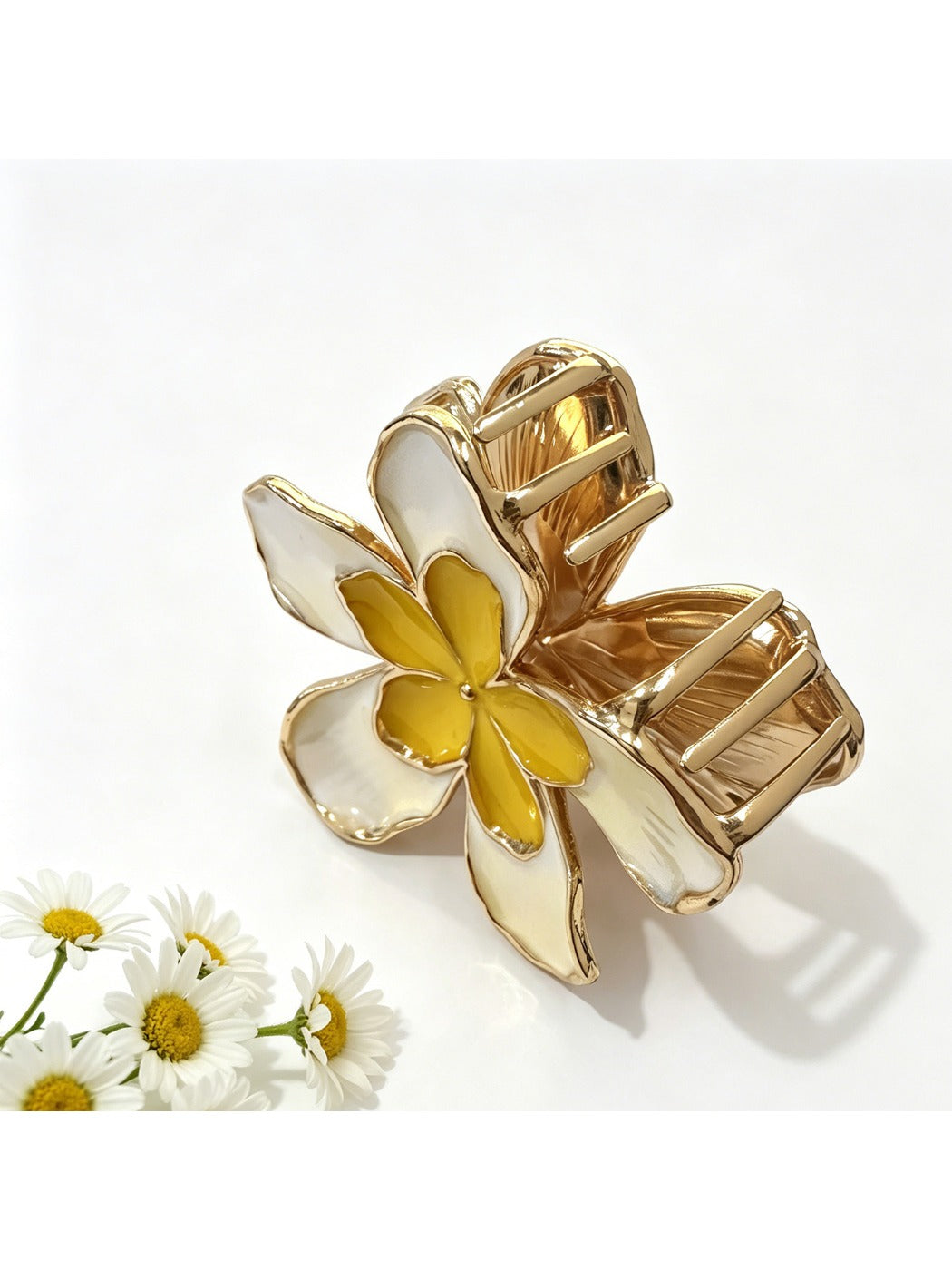 Beau hair clip attached to brown hair, highlighting its rustic floral design