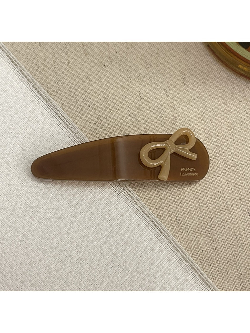 Beau - Bow Embellished Oval Hair Clip