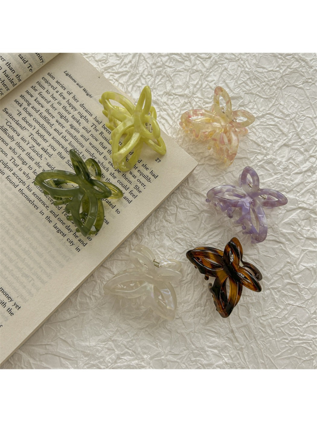 Close-up of Beau butterfly claw clip showing acetate material and butterfly shape