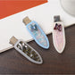 Side view of Beau oval butterfly hair clip highlighting clip mechanism