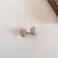 Beau bow hair clip in pastel pink with a metal clip backing