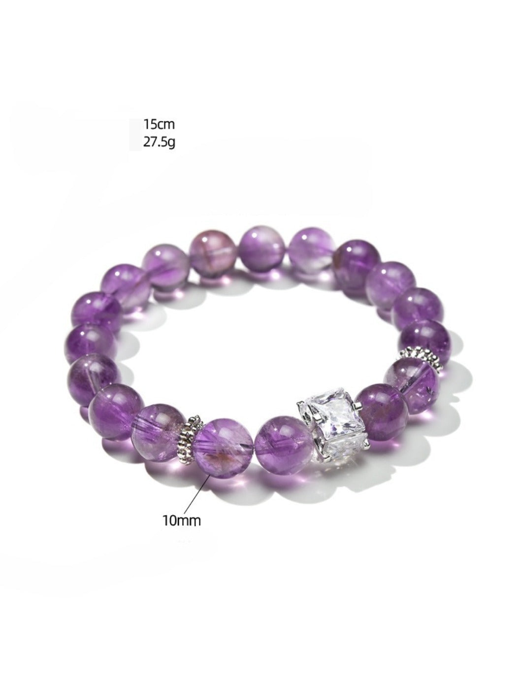 Lovra purple crystal bracelet displayed on a wooden surface with soft lighting