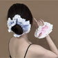 Close-up of Gifty Sweet Stripe Ruffle Scrunchie showing fabric texture and ruffle detail