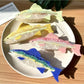 Close-up of Beau salmon shaped hair claw clip showing detailed design