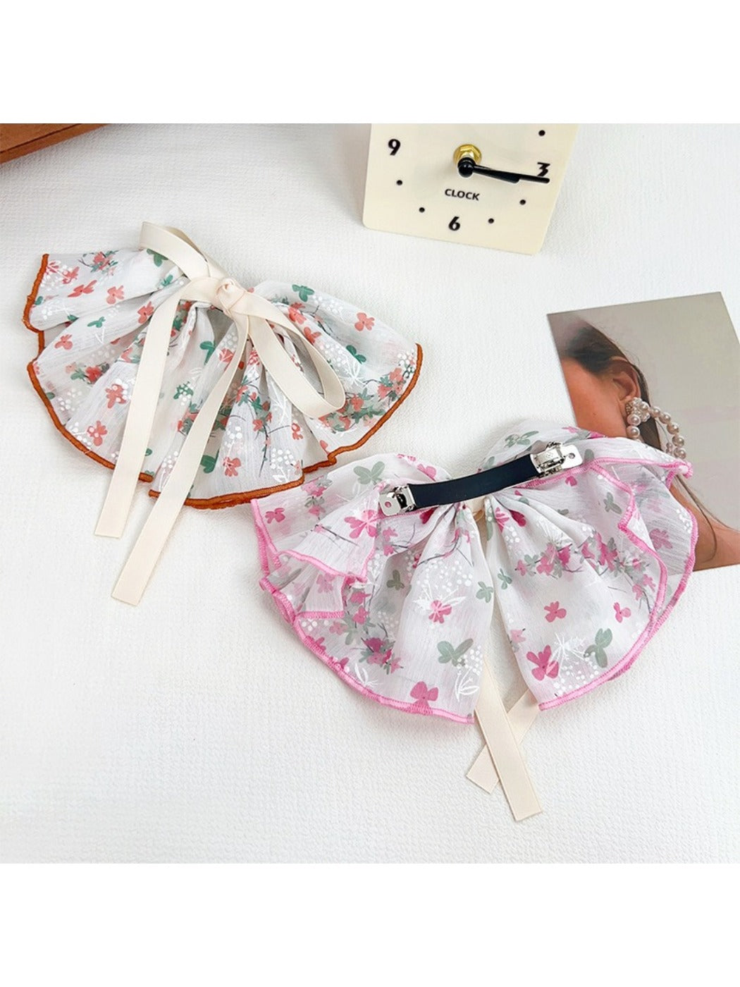 Side view of Beau Chic Sweet Bow Hair Clip highlighting clip mechanism and bow shape