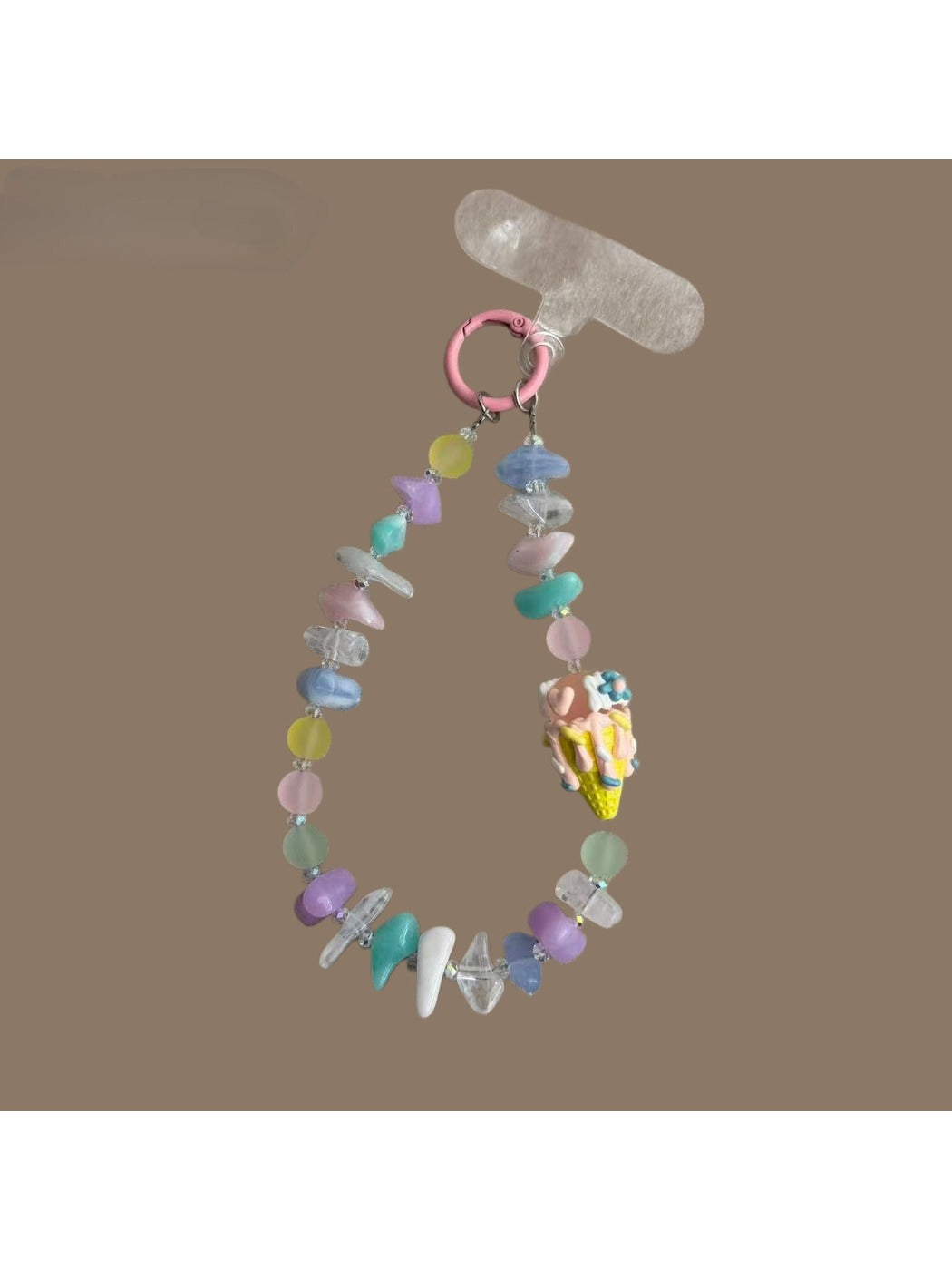 Close-up of Keypus beaded phone strap keychain with colorful beads and gold accents
