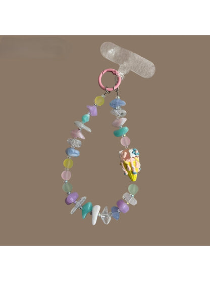 Close-up of Keypus beaded phone strap keychain with colorful beads and gold accents