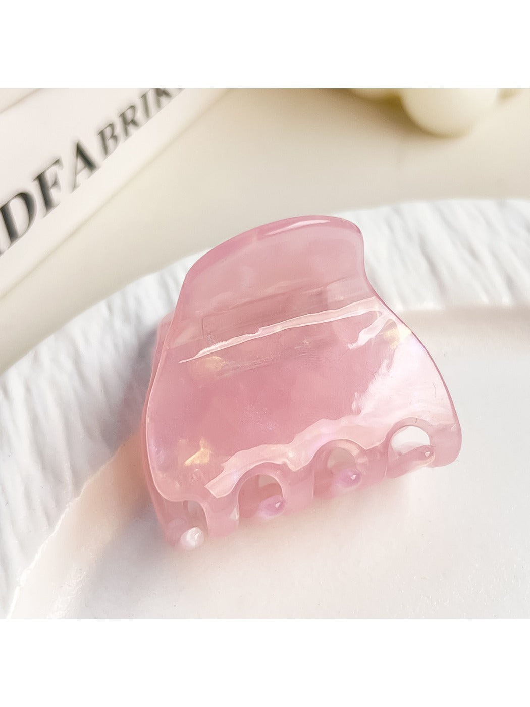 Beau half moon claw clip open showing claw teeth and hinge