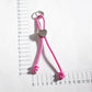 Close-up of multicolored rope heart keychain showing detailed texture