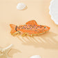 Beau personalized fish shaped hair clip displayed on white background