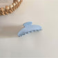 Beau Simple Polka Dot Acetate Hair Clip placed on white background for product detail