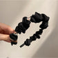 Gifty heart shape rhinestone headband packaged in clear box with branding