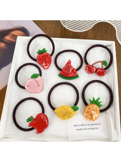Set of colorful hair ties decorated with cute fruit charms including strawberries and oranges