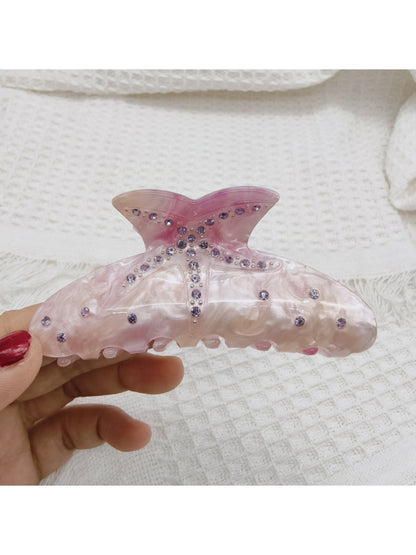 Top view of Beau rainbow claw clip showing the full arc shape
