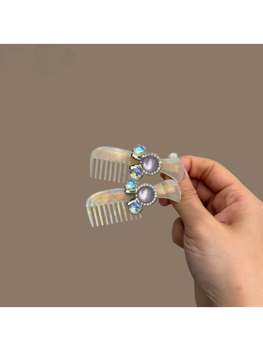 Beau comb-shaped hair clip holding hair in place, showcasing its size and design