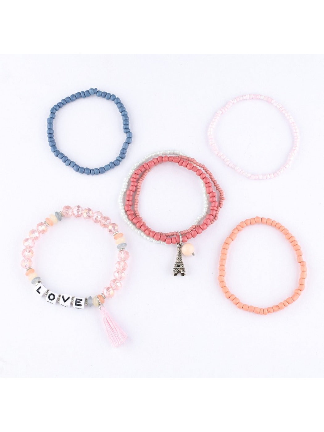 Side view of Lovra stackable bracelet highlighting tassel and bead arrangement