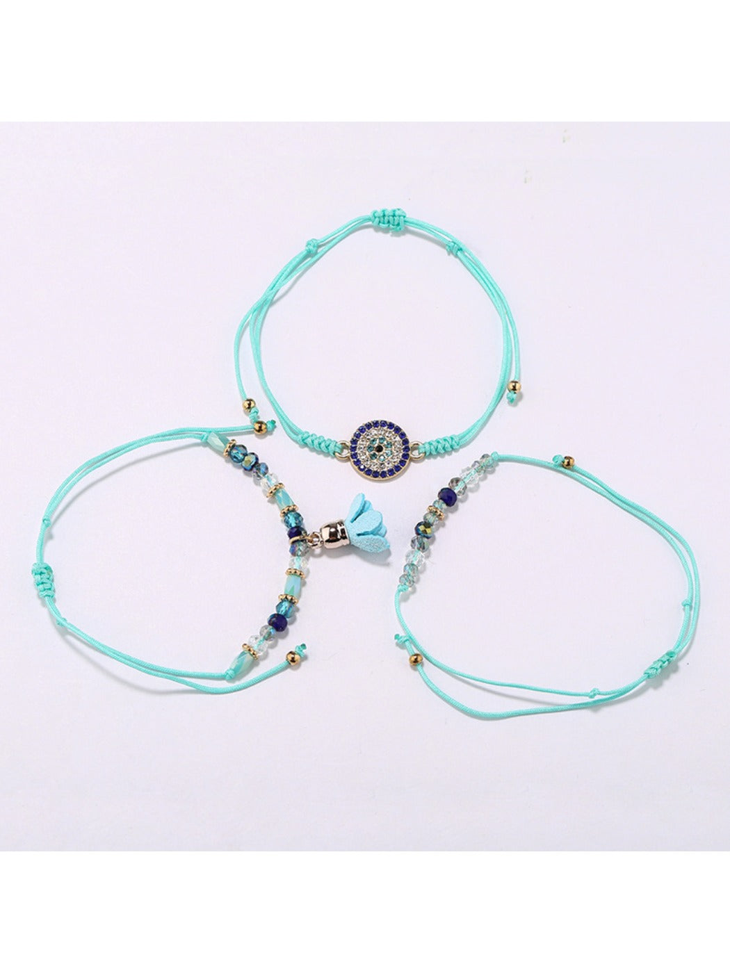 Lovra small bead tassel alloy bracelet displayed flat showing detailed beads and tassel