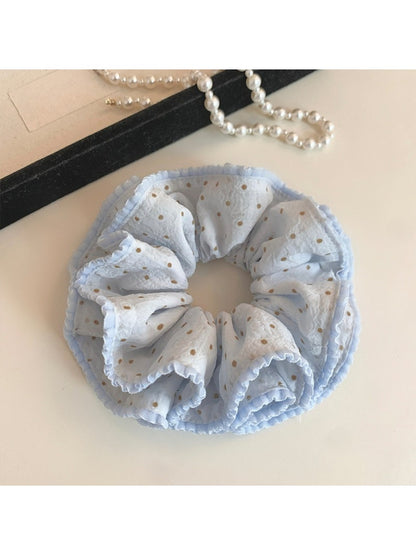Close-up of Gifty Sweet Polka Dot Double Scrunchie in pink with white dots