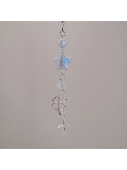 Back view of iridescent star keychain showing smooth surface