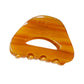 Beau minimalist hollow oval claw clip displayed against a neutral background