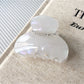 Beau half round hair claw clip with ergonomic design for comfortable grip