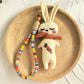 Keypus fabric doll keychain displayed on a white background