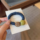 Gifty - Cute Smiley Face Hair Tie