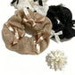 Gifty lace scrunchie with satin bow displayed on a white background