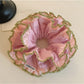 Pink lace trim double scrunchie displayed on a wooden surface