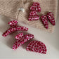 Side view of Beau pink leopard print acetate hair clip highlighting clasp mechanism