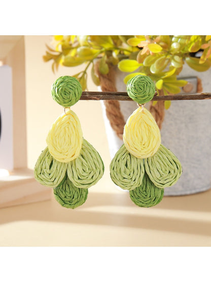 Top view of Earedge color block raffia drop earrings showing oval shape and woven details