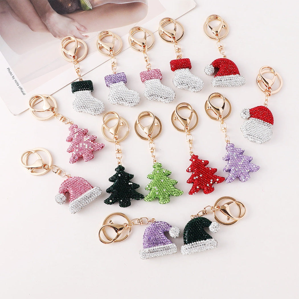 Christmas tree, hat, stocking and Santa face keychains in multiple styles