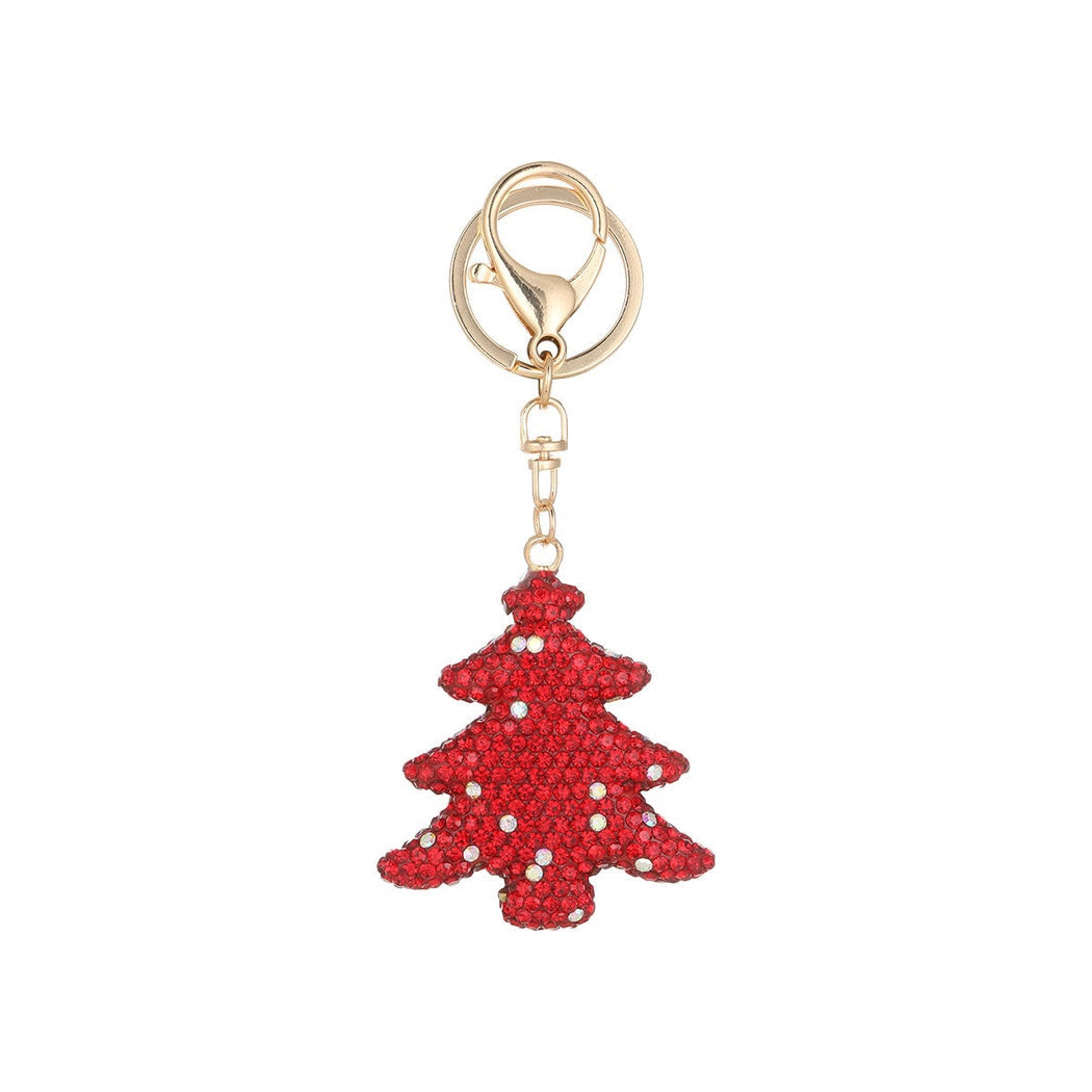 Red Christmas tree keychain on white background
