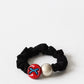 Bow Dog Charm Hair Ties showing multiple available variants