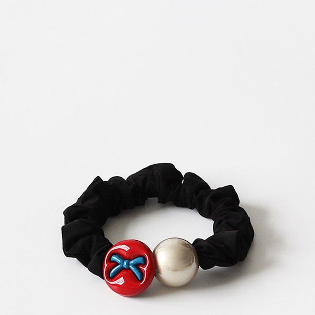 Bow Dog Charm Hair Ties showing multiple available variants