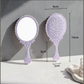 Ornate oval hand mirror dimensions: 9 × 19 cm; handle 8 cm long and 3 cm wide