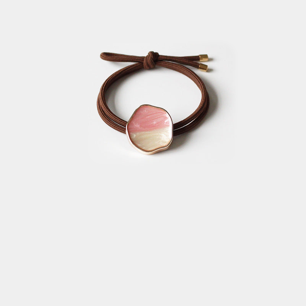 Brown Gifty - Glazed Bead Hair Tie on neutral background