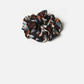 Black Gifty - Gathered Floral Scarf Scrunchie on neutral background