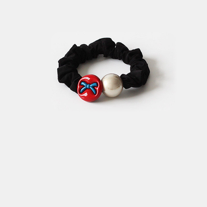 BowBlue Gifty - Bow Dog Charm Hair Tie on neutral background