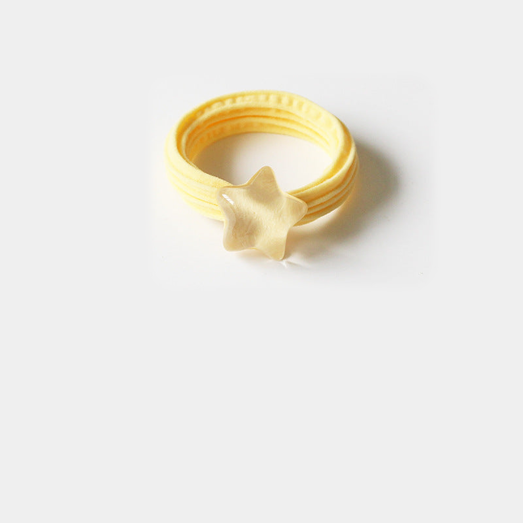 Yellow Gifty - Star Bead Hair Tie on neutral background