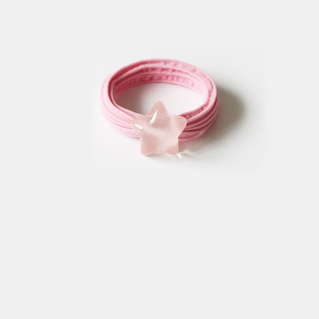 Pink Gifty - Star Bead Hair Tie on neutral background