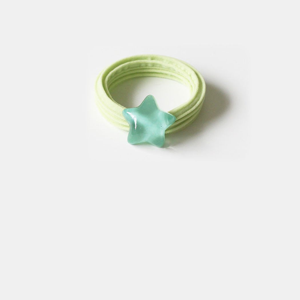 Green Gifty - Star Bead Hair Tie on neutral background