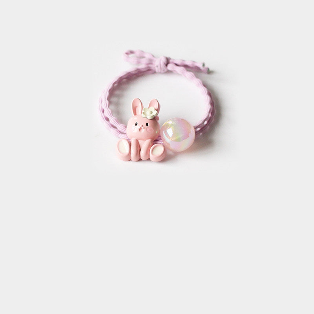 Pink Gifty - Bunny Charm Hair Tie on neutral background