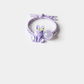 Purple Gifty - Bunny Charm Hair Tie on neutral background