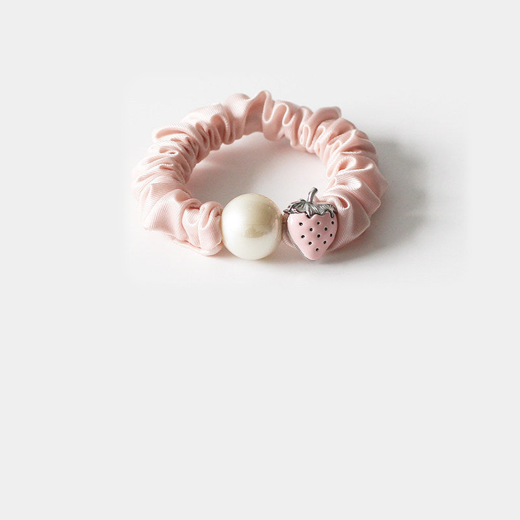 PearlPink Gifty - Strawberry Pearl Hair Tie on neutral background
