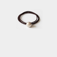Brown Gifty - Round Pearl Bead Hair Tie on neutral background