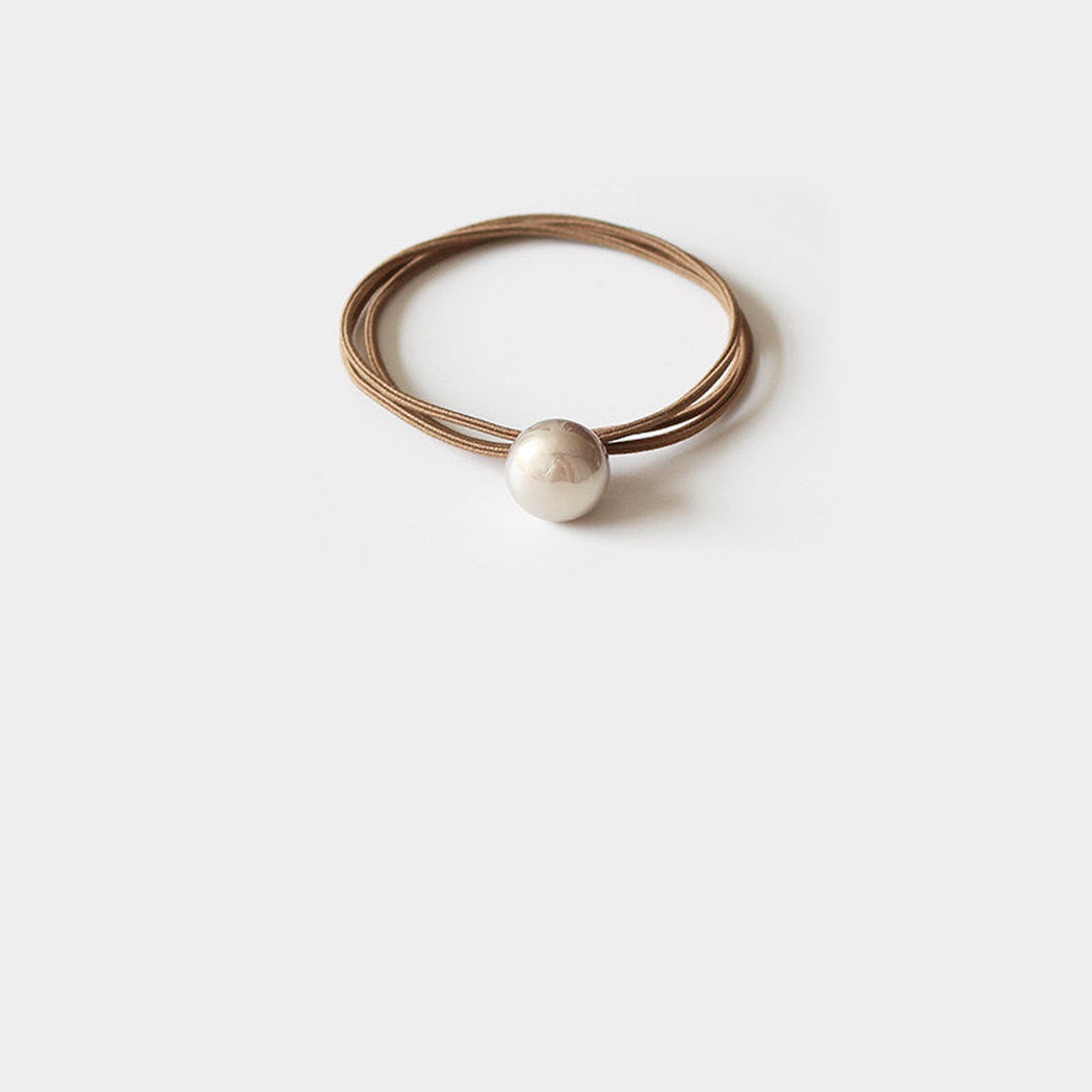 Khaki Gifty - Round Pearl Bead Hair Tie on neutral background