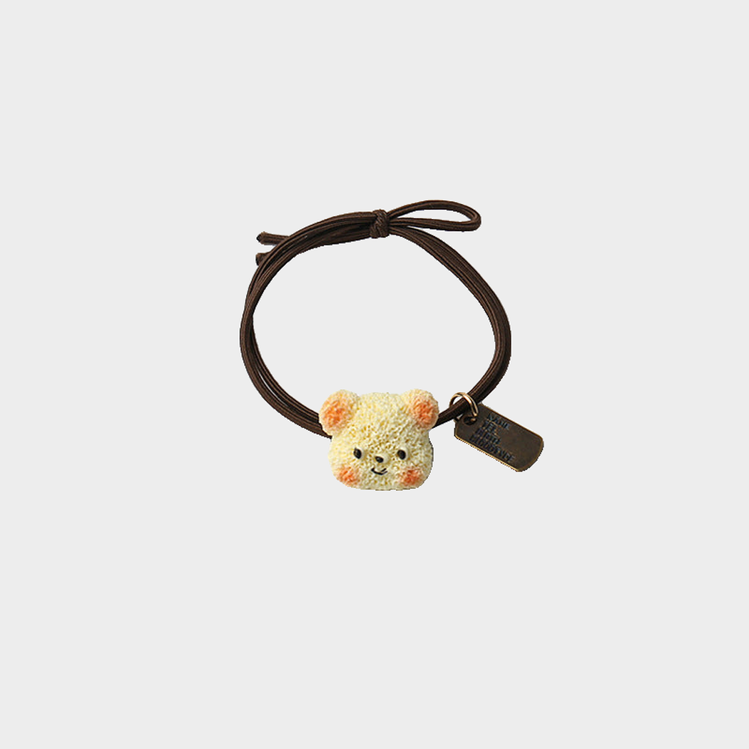 BearYellow Gifty - Dog Bear Charm Hair Tie on neutral background