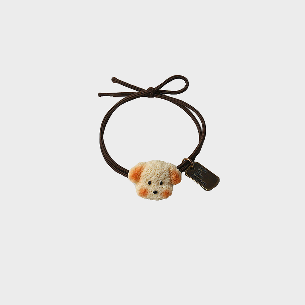 DogYellow Gifty - Dog Bear Charm Hair Tie on neutral background