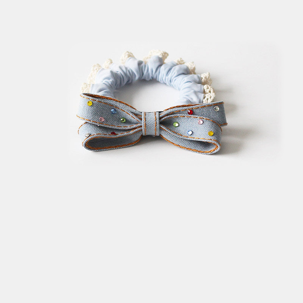 BowBlue Gifty - Blue Bow Crystal Hair Tie on neutral background